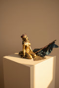 Dame en bronze viennoise sur une chaise, gardée